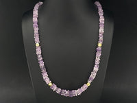 COLLIER 375/- GELBGOLD MIT AMETHYST & HÄMATIT BEH. (GES. CA. 95,0 ct.)