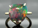 RING AUS 375/- GELBGOLD MIT KRISTALLOPAL (ca. 4,0 ct.)