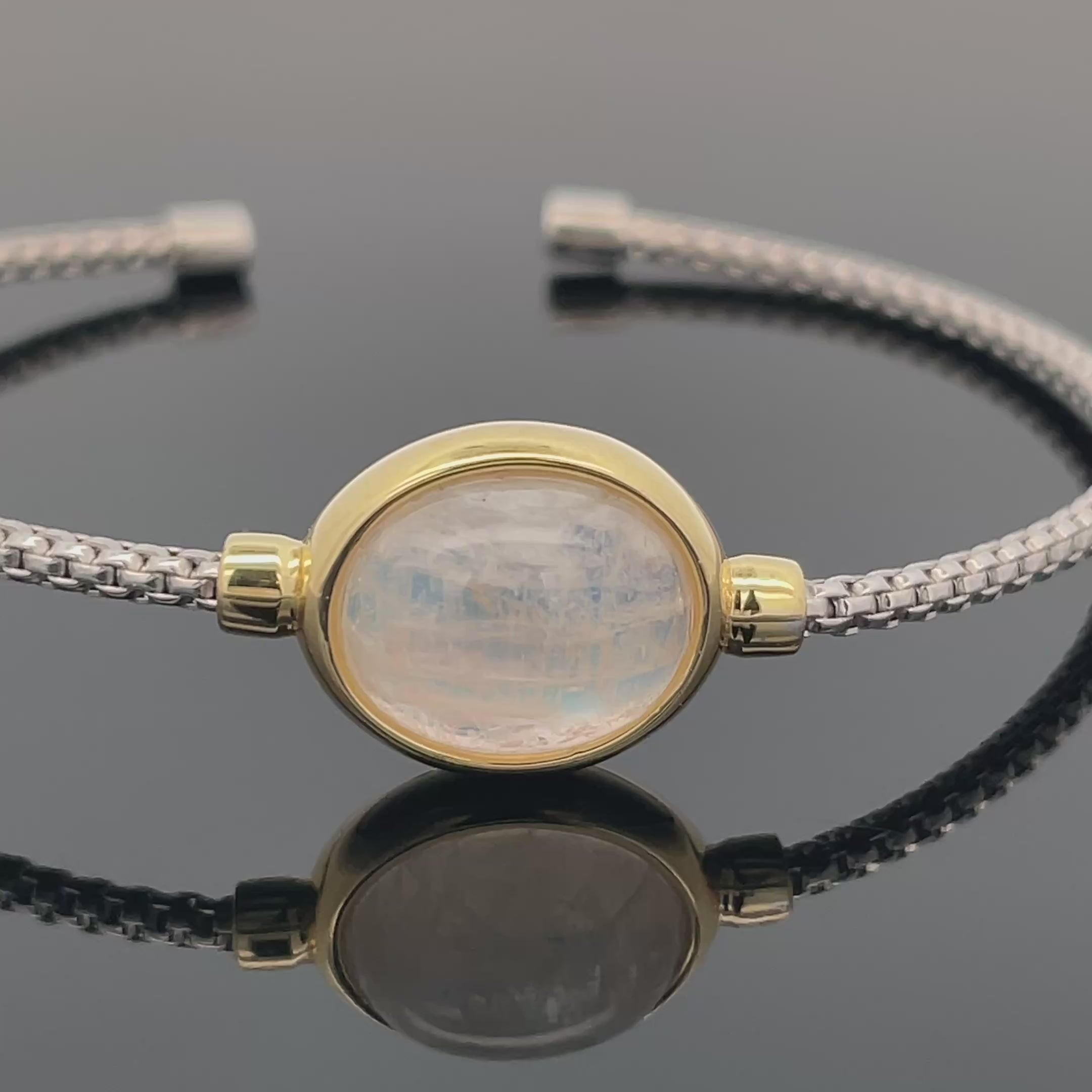 ARMREIF 925/-SILBER RHODINIERT/VERGOLDET MIT RAINBOW MONDSTEIN (ca.3,50 ct.)