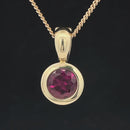 CLIP-ANHÄNGER AUS 375/- GELBGOLD MIT ALMANDIN (CA. 1,10 ct.)
