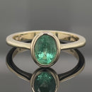 RING AUS 375/- GELBGOLD MIT SAMBIA SMARAGD (CA. 0,52 ct.)