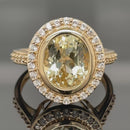 RING AUS 375/- GELBGOLD MIT HIDDENIT & ZIRKON (ges. ca. 4,79ct.)