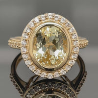 RING AUS 375/- GELBGOLD MIT HIDDENIT & ZIRKON (ges. ca. 4,79ct.)