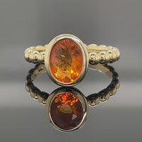 RING AUS 375/- GELBGOLD MIT FEUEROPAL (CA. 0,66 ct.)