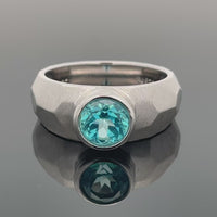 RING AUS 925/- SILBER RHODINIERT MIT TOPAS (BEH.) PARAIBAFARBEN (CA. 0,9 ct.)