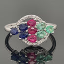 RING AUS 925/- SILBER RHODINIERT MIT SAPHIR, RUBIN, SMARAGD & ZIRKON