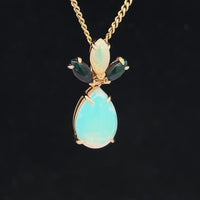 ANHÄNGER AUS 375/- GELBGOLD MIT KRISTALLOPAL (GES. CA. 1,605 ct.)