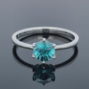 RING GR.19 (60) AUS 375/- WEIßGOLD MIT ZIRKON BLAU ( CA. 1,80 ct.)