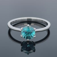RING GR.19 (60) AUS 375/- WEIßGOLD MIT ZIRKON BLAU ( CA. 1,80 ct.)