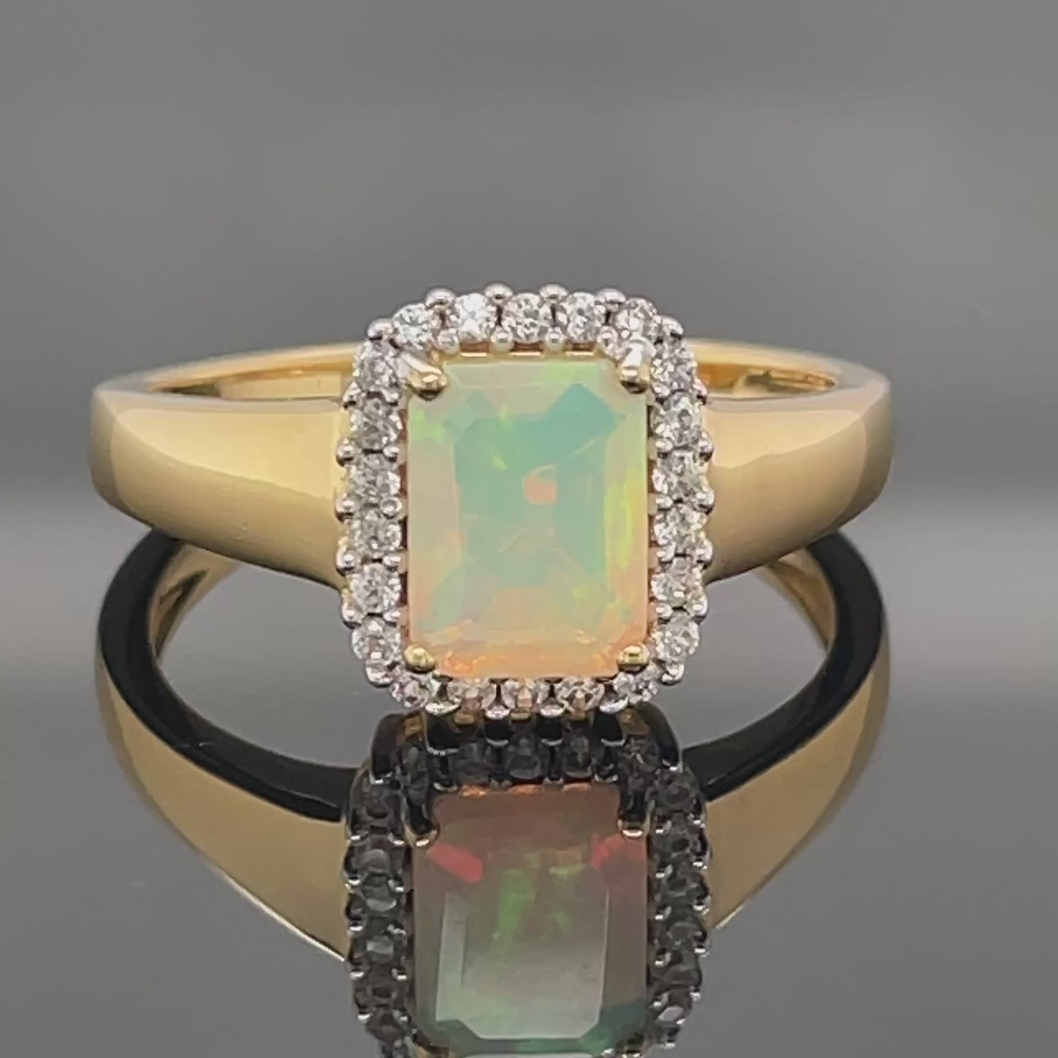 RING AUS 925/- SILBER VERGOLDET MIT ÄTHIOP. OPAL & ZIRKON