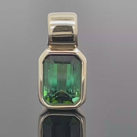 ANHÄNGER AUS 375/- GELBGOLD MIT GOLKONDA TURMALIN (CA. 1,10 ct.)