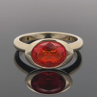 RING AUS 375/- GELBGOLD MIT FEUEROPAL (CA.1,10 ct.)