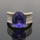 RING GR.16 (50) AUS 585/- GELBGOLD MIT TANSANIT AAAAA & BRILLANTEN (GES. CA. 0,55ct.)