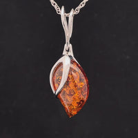 ANHÄNGER AUS 925/- SILBER RHODINIERT MIT BERNSTEIN ( CA. 3,50 ct.)