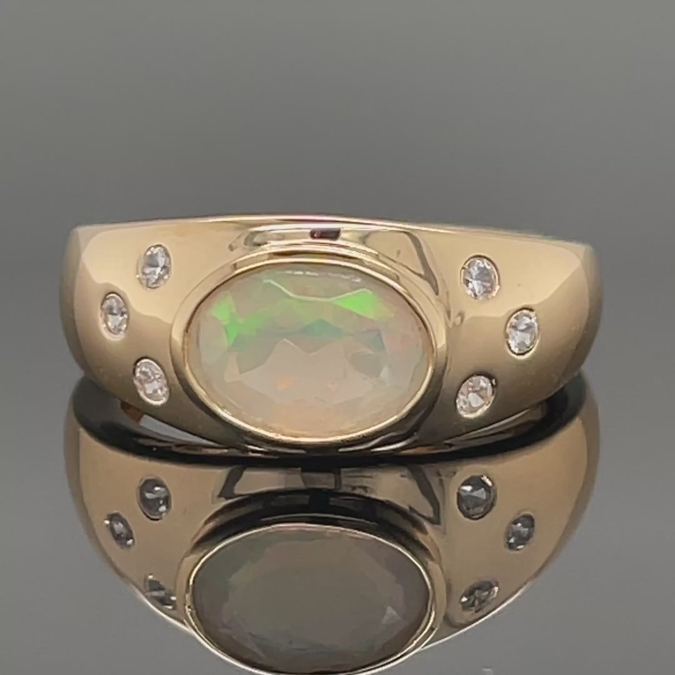 RING AUS 925/- SILBER VERGOLDET MIT ÄTHIOP. OPAL & ZIRKON