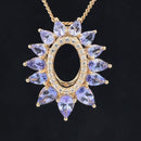 ANHÄNGER AUS 375/- GELBGOLD MIT TANSANIT & ZIRKON ( GES. CA. 3,014 ct.)