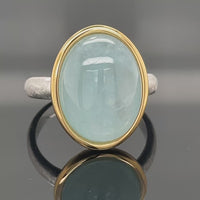 RING AUS 925/- SILBER BICOLOR MIT MILKY AQUAMARIN (CA. 7,0 ct.)