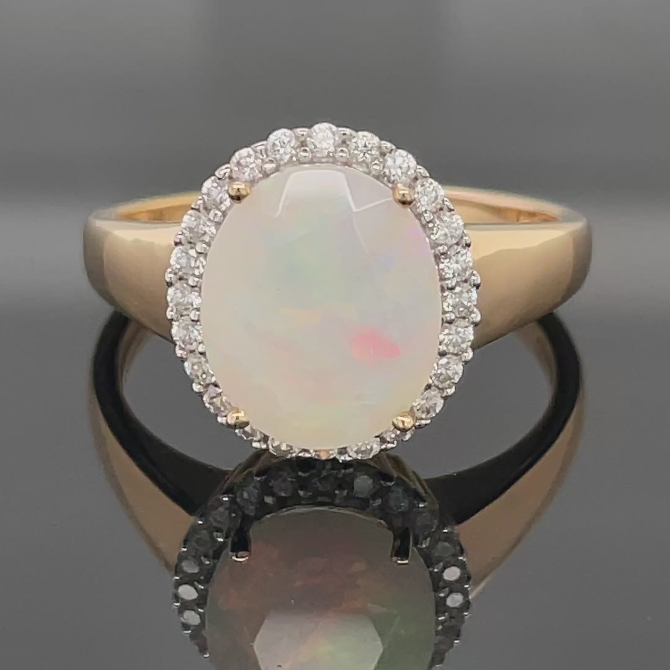 RING AUS 925/- SILBER VERGOLDET MIT ÄTHIOP. OPAL & ZIRKON