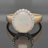 RING AUS 925/- SILBER VERGOLDET MIT ÄTHIOP. OPAL & ZIRKON