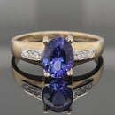 RING AUS 375/- GELBGOLD MIT TANSANIT AAAA & BRILLANTEN (GES.CA. 1,56ct.)