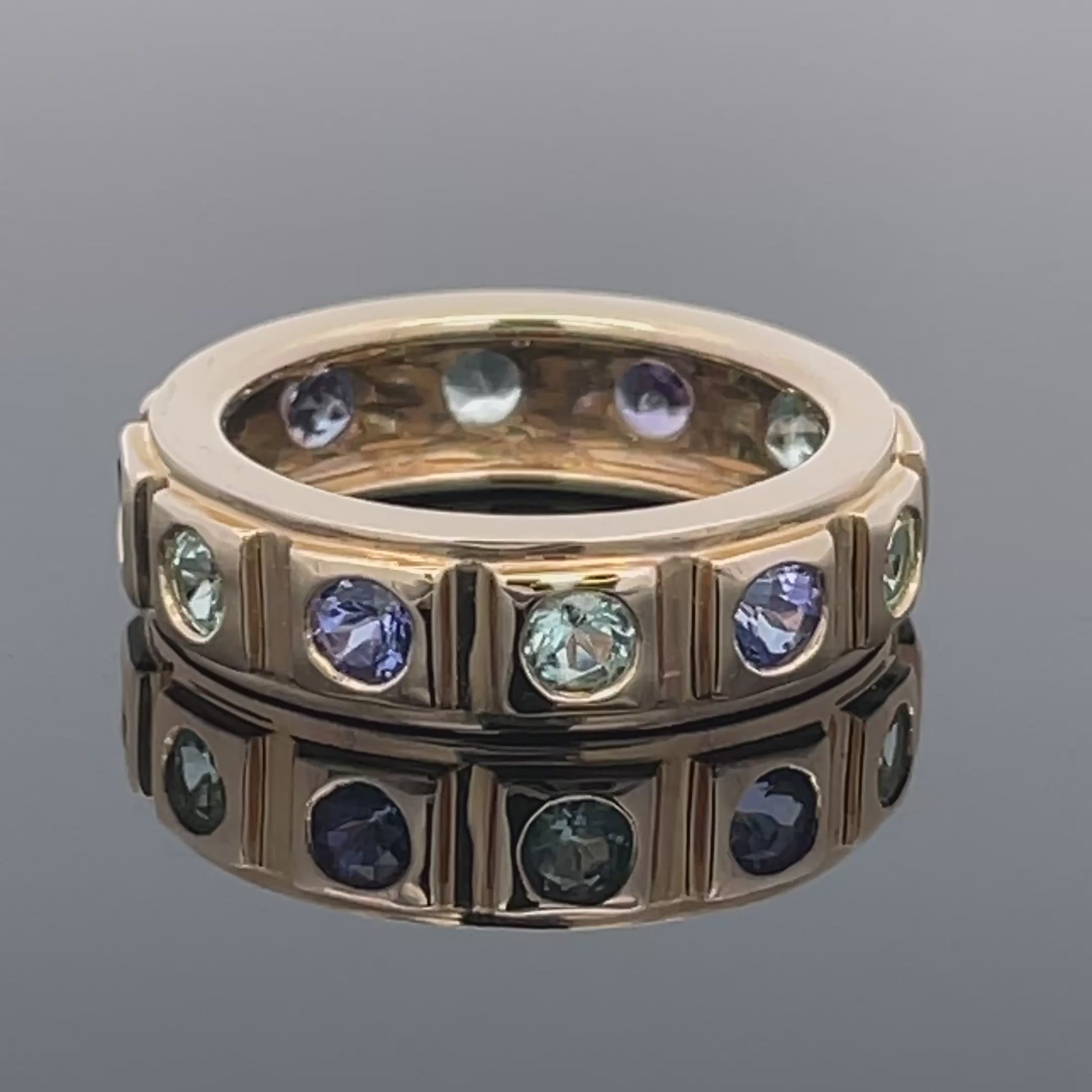 RING AUS 585/- GELBGOLD MIT PARAIBA-TURMALIN & TANSANIT AAA
