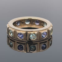 RING AUS 585/- GELBGOLD MIT PARAIBA-TURMALIN & TANSANIT AAA