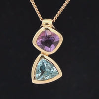 ANHÄNGER AUS 375/- GELBGOLD MIT AMETHYST & BLAUTOPAS
