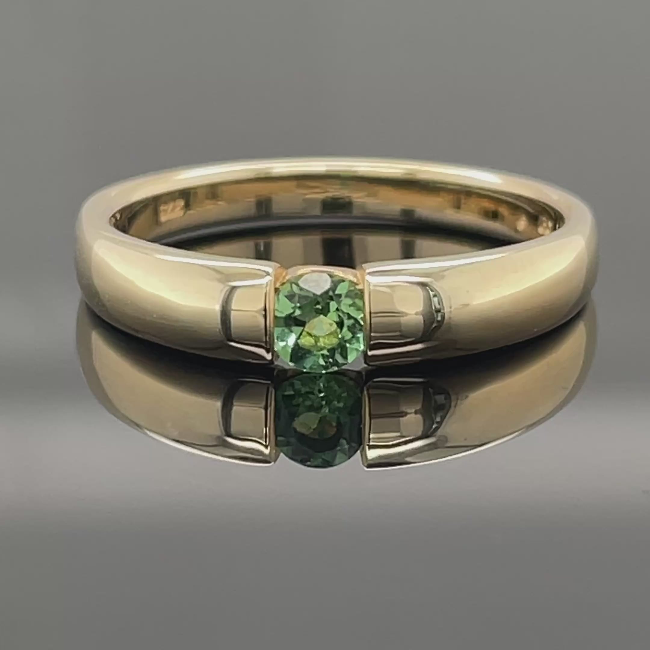 RING AUS 375/- GELBGOLD MIT GOLKONDA TURMALIN (CA.0,19 ct.)