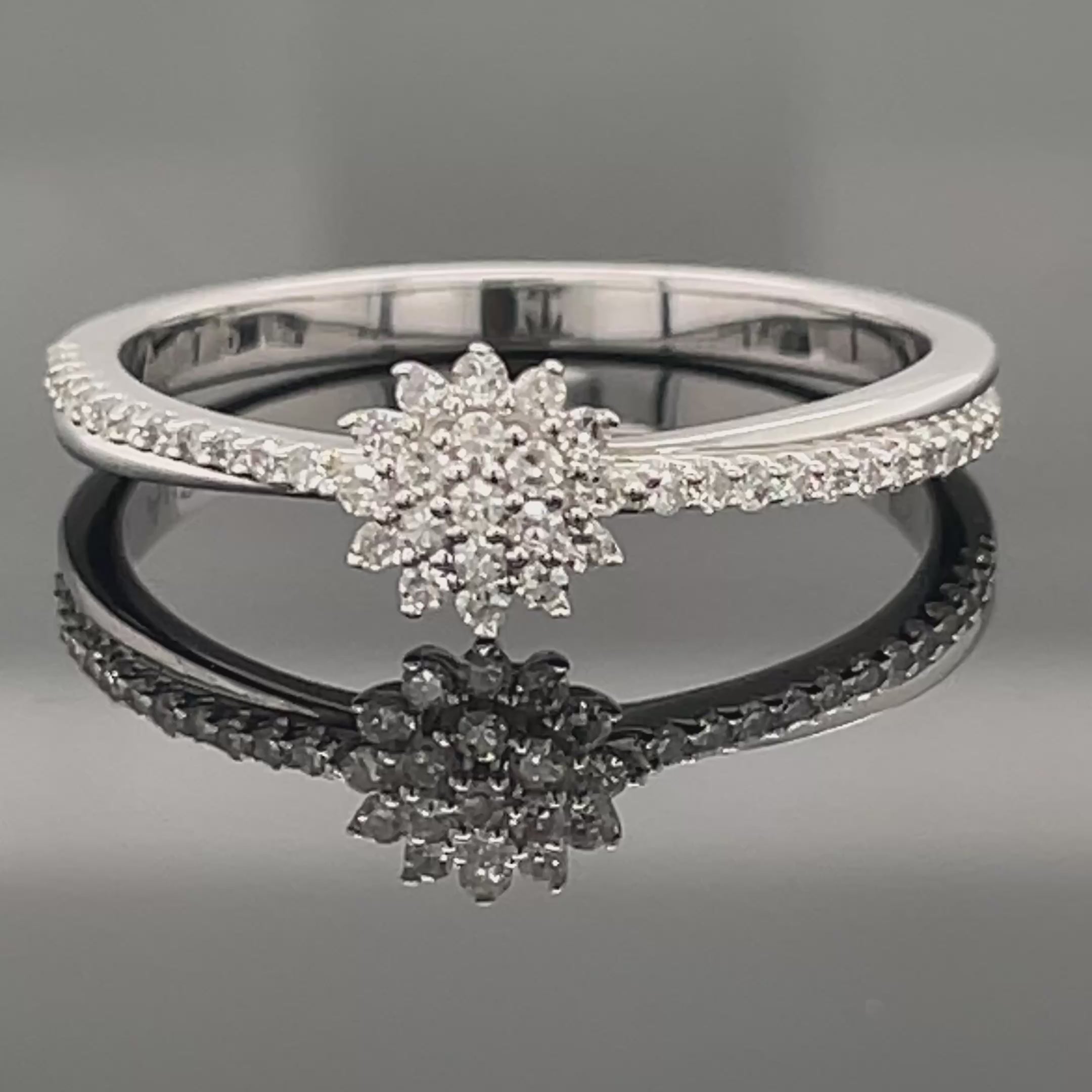 RING AUS 375/- WEIßGOLD MIT DIAMANTEN  (GES. CA. 0,25 ct.)