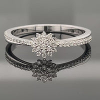 RING AUS 375/- WEIßGOLD MIT DIAMANTEN  (GES. CA. 0,25 ct.)