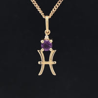 ANHÄNGER "FISCH" AUS 375/- GELBGOLD MIT AMETHYST & DIAMANT (GES. CA. 0,28 ct.)